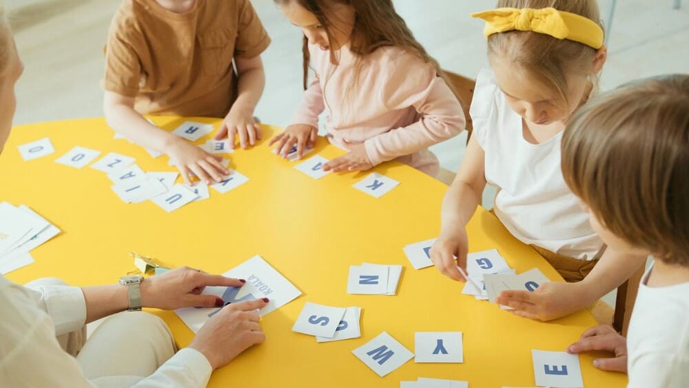 children working together around a table